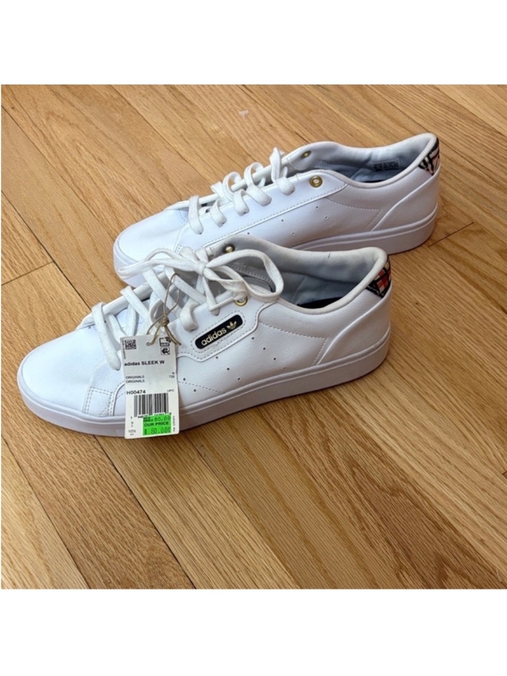 adidas White Women's Leather Sneakers with Subtle Gold Accents